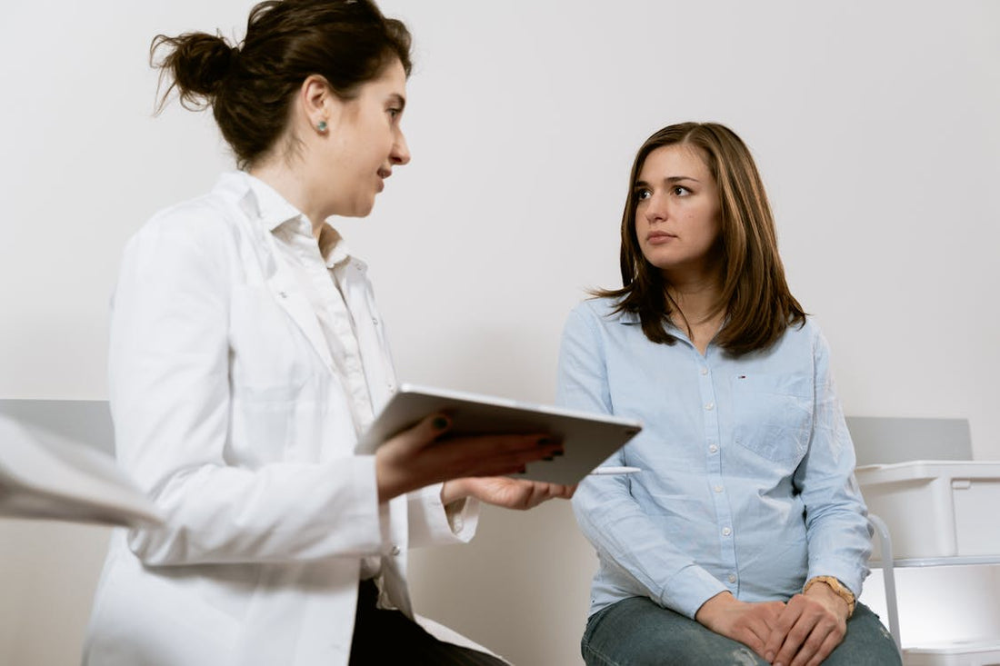 Doctor reviewing cost analysis for in-house rapid testing program